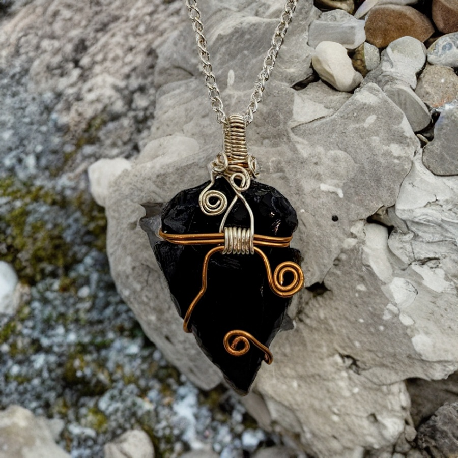 Obsidian arrowhead hot sale necklace meaning