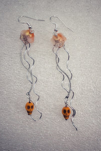 Jellyfish with pirate skull earrings