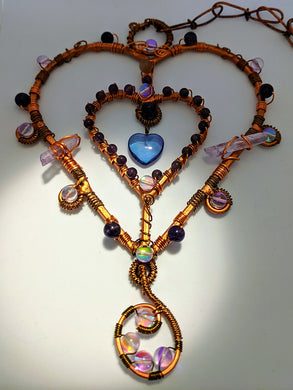 Lavender Aura Quartz& Amethyst w single sunstone. The Heart is Tanzanite Aura Quartz , Sun catcher - local pick up - Echo of a Stone 